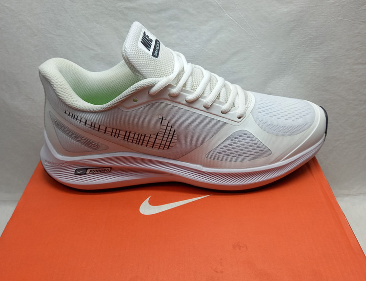 کتونی نایک گاید ۱۰ سفید مشکی شطرنجی نمای بیرونی