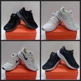 نمای کلی از کتونی نایک گاید ۱۰ وارداتی در رنگهای متنوع با طراحی اسپرت و زیره نرم