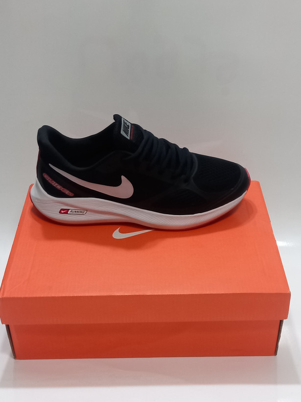 | مشکی زیره قرمز | کتونی نایک گاید ۱۰ وارداتی رنگ مشکی با زیره قرمز مناسب پیادهروی طولانی |